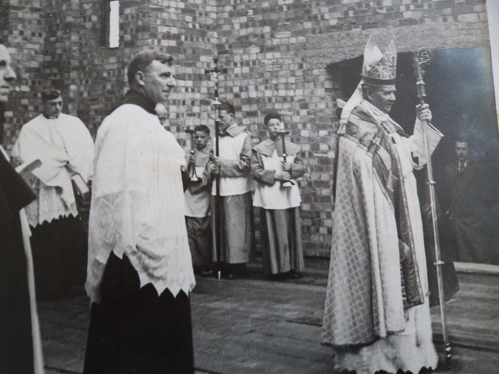 A bishop and clergy at an outdoor ceremony