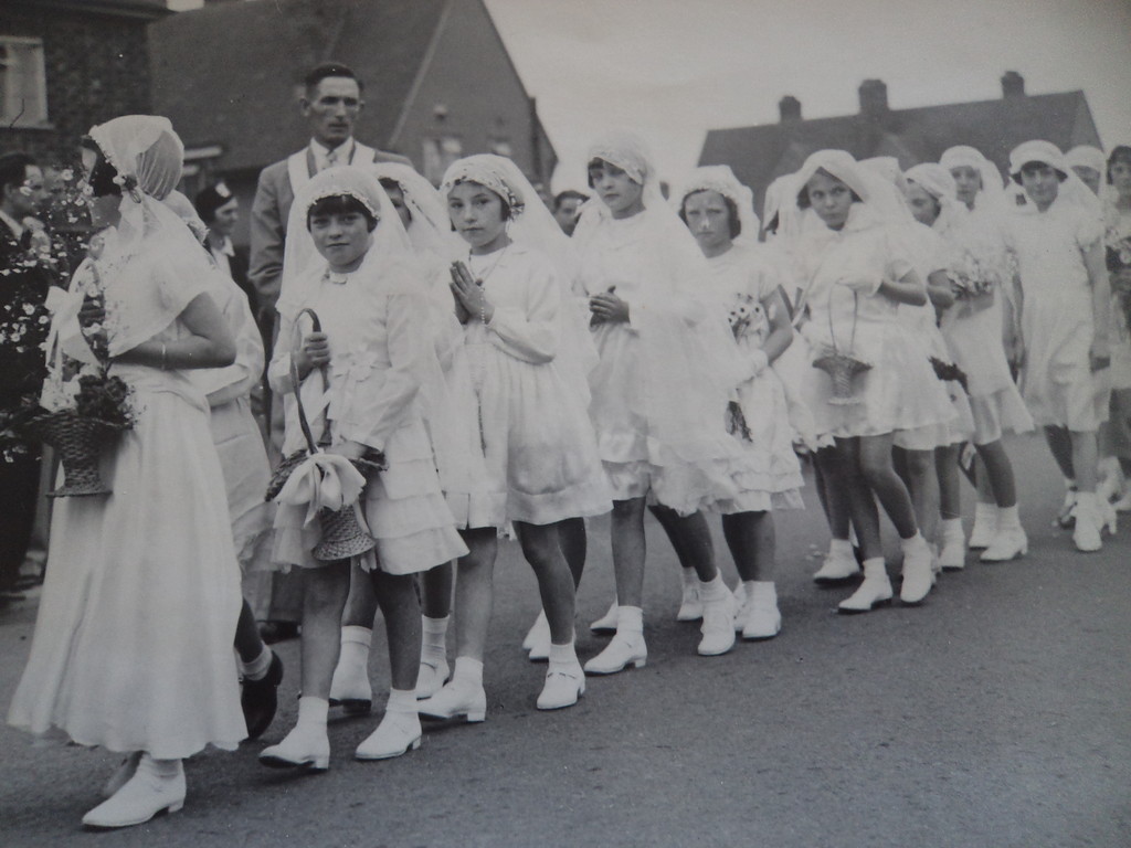 Girls taking part in a street procession