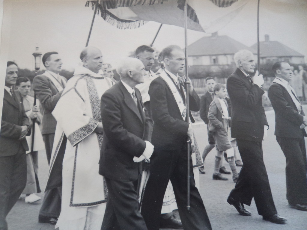 Another view of clergy and guests in procession