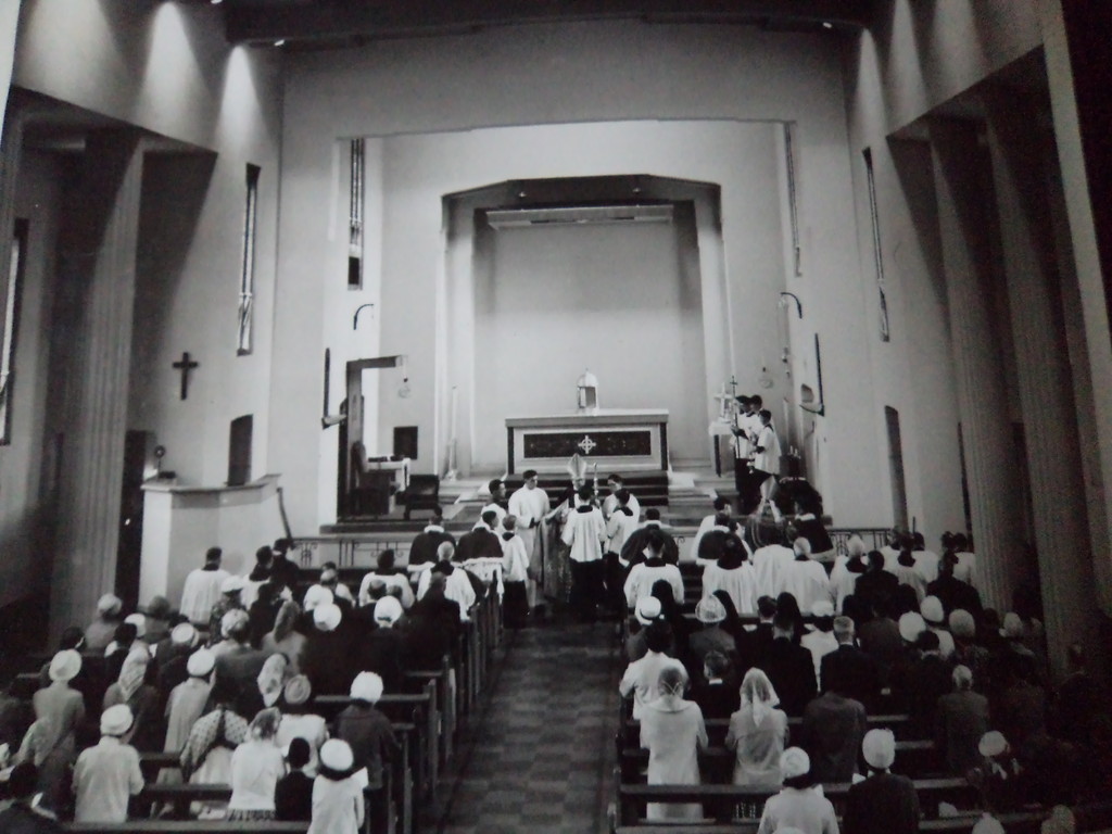 A service taking place inside the church