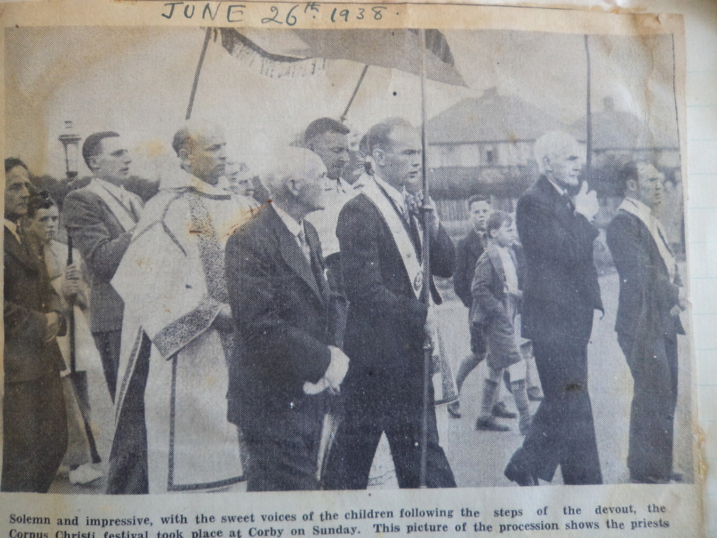 A printed archival photograph of a church procession