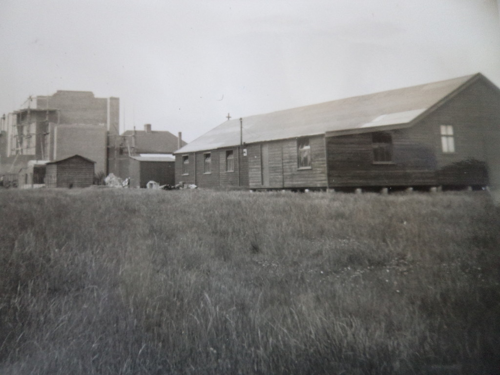 An archival view of the church and surrounding buildings